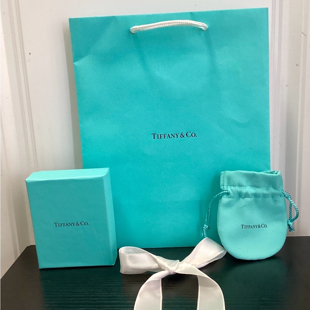Authentic Tiffany & Co. gift bags and boxes in iconic blue